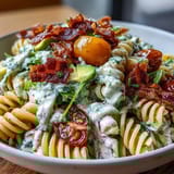 Creamy avocado ranch BLT pasta salad with al dente rotini, perfect for summer picnics and backyard gatherings.  