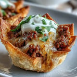 Enjoy these Mini Taco Cups in Wonton Wrappers, baked until golden, perfect party bites.