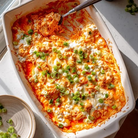 A creamy, spicy, and irresistibly cheesy dip perfect for game day snacking.